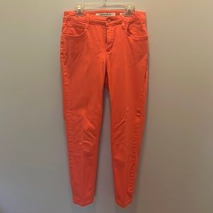 Salmon skinny jeans